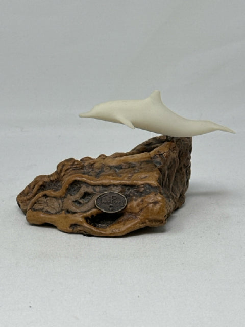 John Perry Dolphin Sculpture on Burled Wood