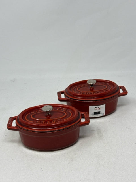 Pair of Red Miniature Staub Cast Iron Oval Cocottes