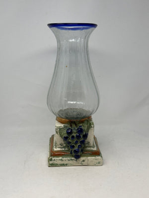 Ribbed Glass Urn with Blue Trim in Ceramic Fruit Motif Stand